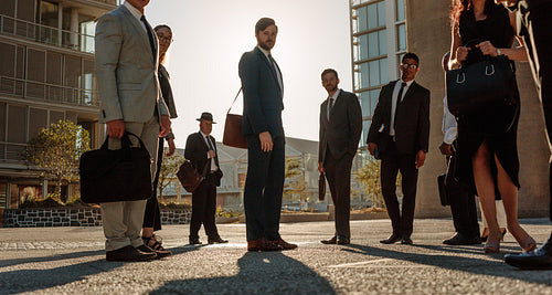 Business people standing on street