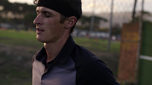 Tennis player looking tired during a match