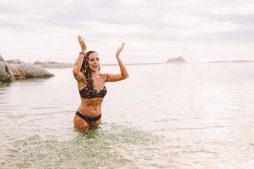 Woman enjoying in the sea water