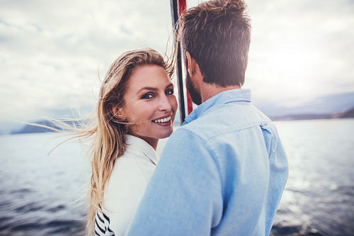 Loving young couple on a romantic boat trip