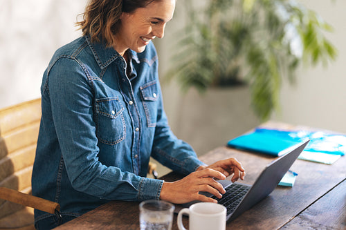 Motivated businesswoman excels in a productive workplace
