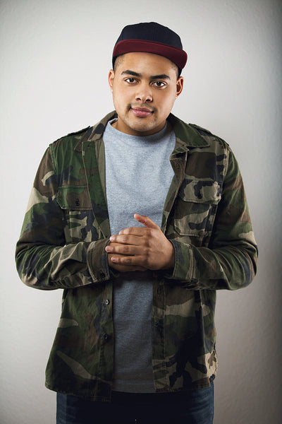 Handsome male fashion model posing in casual wear