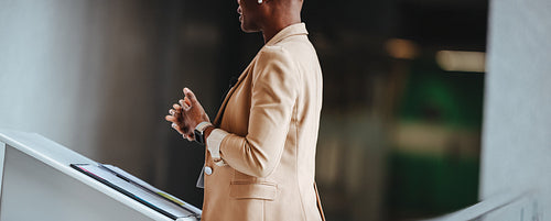 Professional speaker at business conference presenting to audience