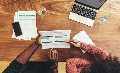 Top view of business coworkers discussing work