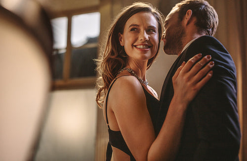 Elegant couple dancing at a party