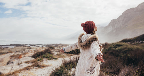 Relaxed woman on a winter day at the beach