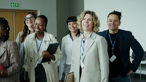Smiling business people at an event