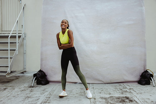 Female athlete relaxing after workout