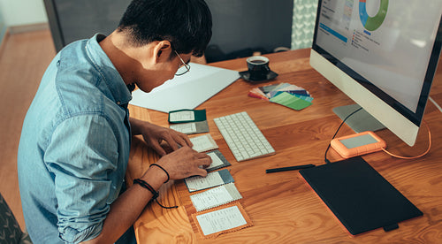 Designer doing fabric selection for new project