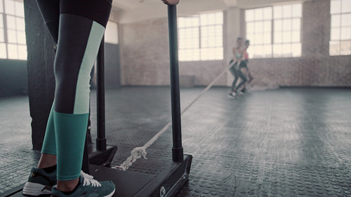 Females doing physical training at gym