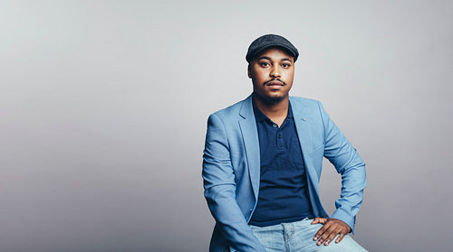 Portrait of businessman in cap