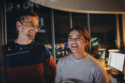 Collaborative business strategy for success: Business people brainstorming at night