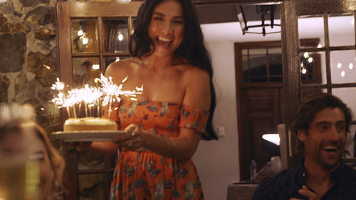 Young people celebrating friend's birthday