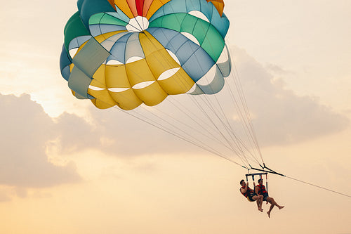 Reaching new heights: Friendship and adventure at sunset