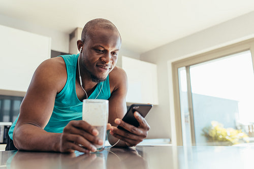Man enjoying music at the breakfast table