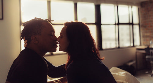 Affectionate couple about to kiss each other