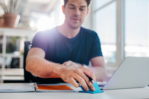 Young businessman working at his desk