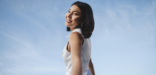 Woman taking a fun selfie outdoors