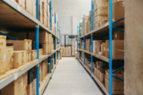 Defocused view of warehouse shelves