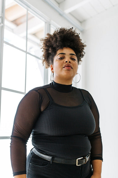 Attractive woman in black outfit