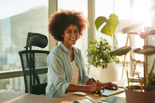 Afro american woman at her creative workplace
