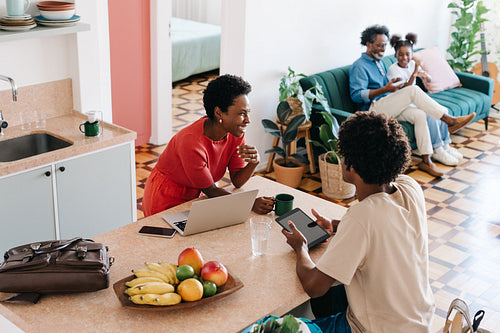Domestic life with a Brazilian family: Parents and kids enjoying a relaxed morning at home