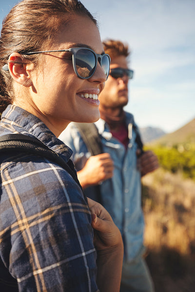 Hiker couple enjoying vacation in countryside