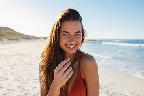 Beautiful young woman on the beach