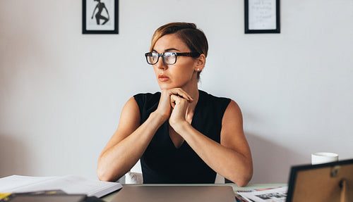 Woman at her desk in office