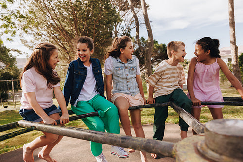Group of happy kids enjoying a day at the playground together