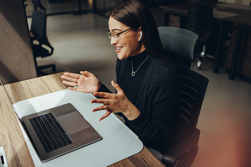 Businesswoman speaking during an online meeting