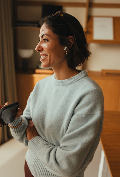 Woman takes a call in a contemporary office