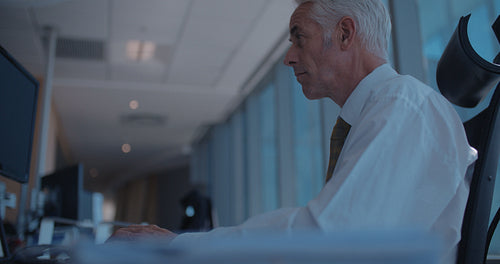 Businessman busy working on computer