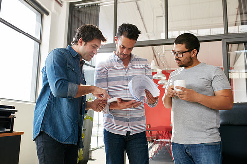 Creative people discussing plans in meeting at office