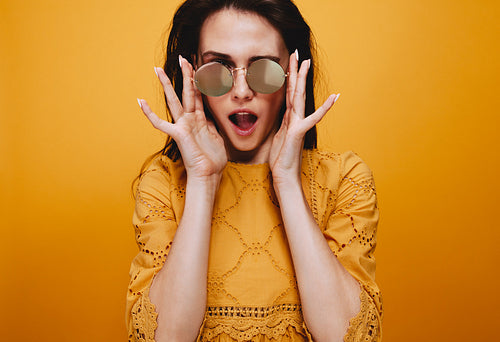 Beautiful model in mirrored sunglasses