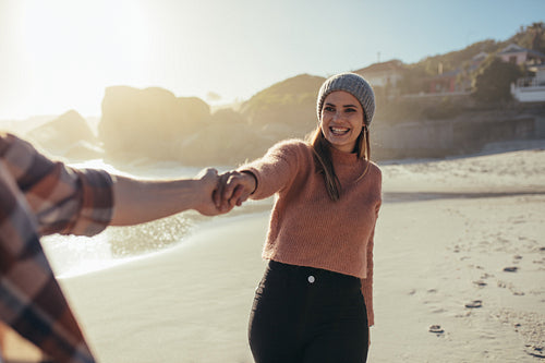 Smiling woman walking with her boyfriend
