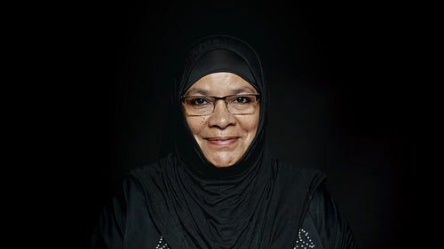 Happy arabic woman in eyeglasses