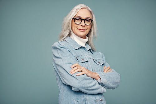 Empowered mature woman looking at the camera confidently