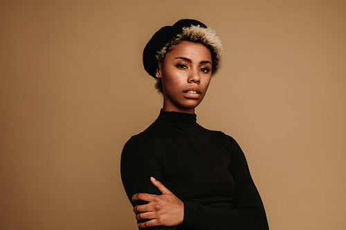 Close up of african american woman on brown background
