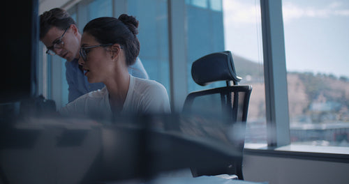 Business colleagues working in office