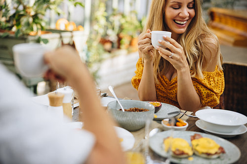Married couple enjoying breakfast on a romantic vacation