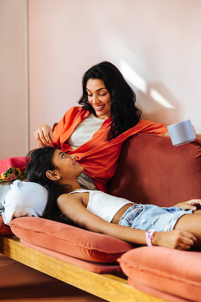 Mother and daughter sharing a special moment together at home