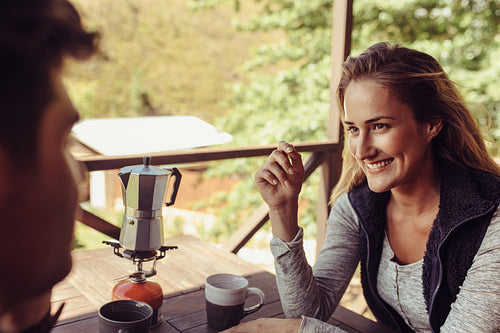 Couple on holiday having breakfast