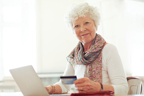 Mature Lady with Credit Card Shopping Online