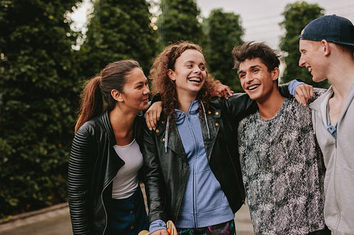 Mixed race group of people having fun outdoors