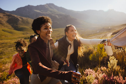 Group hiking in scenic mountain landscape