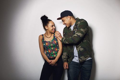 Cheerful young couple enjoying themselves