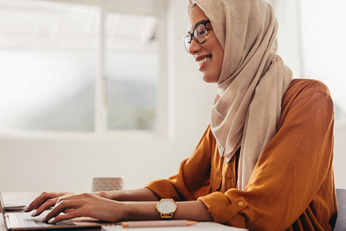 Muslim businesswoman working from home