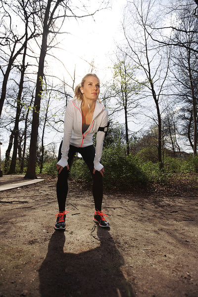 Young woman resting after jogging