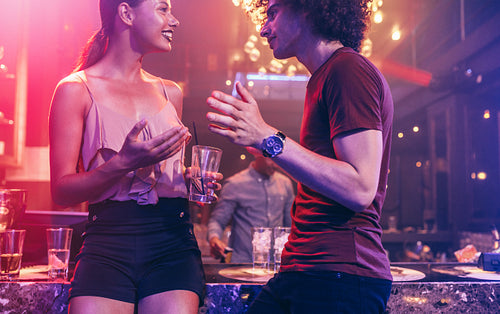 Young couple enjoying at a nightclub